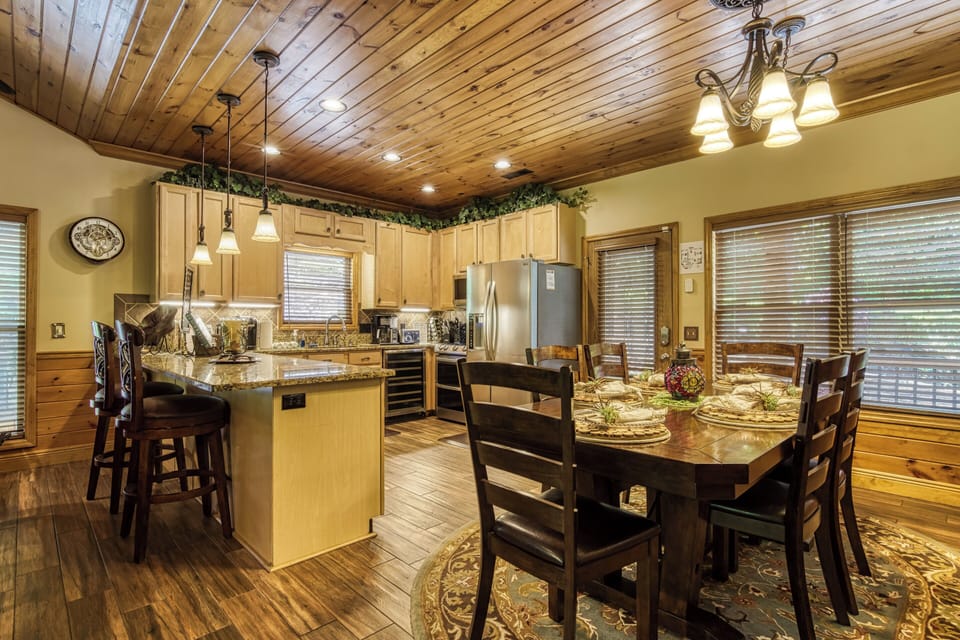 Luxury Smoky Mountain Cottage "Crystal Waters" - Dining table and fully furnished kitchen