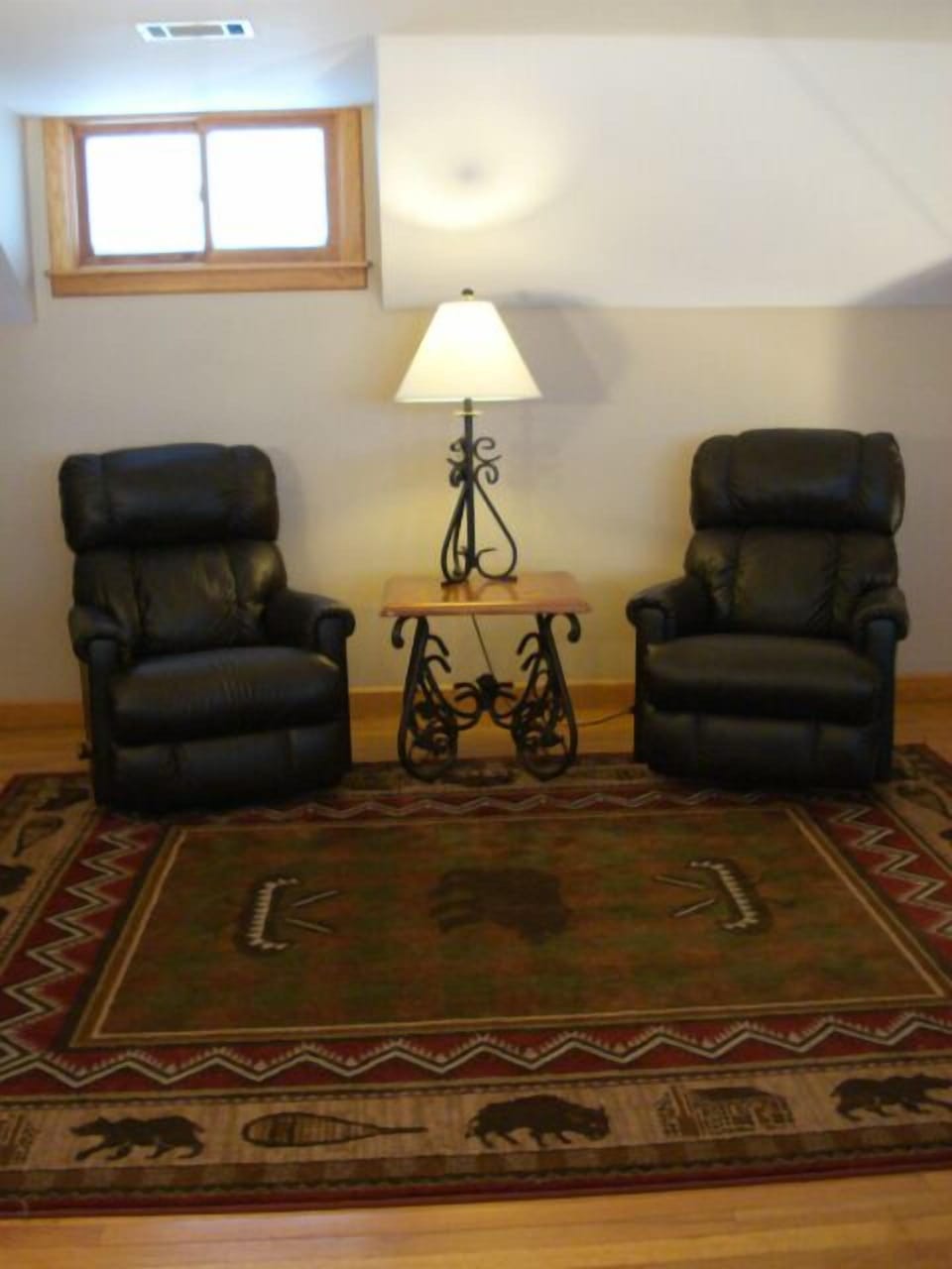 Rest and relax on two comfortable leather lazy boys.