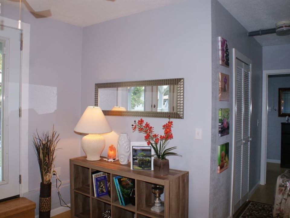 Downstairs hallway leading to bedrooms and bathroom