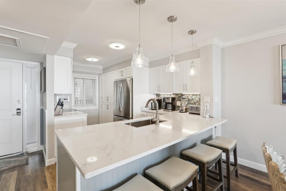 Kitchen with Breakfast Counter Seats Four at 2403 Island Club