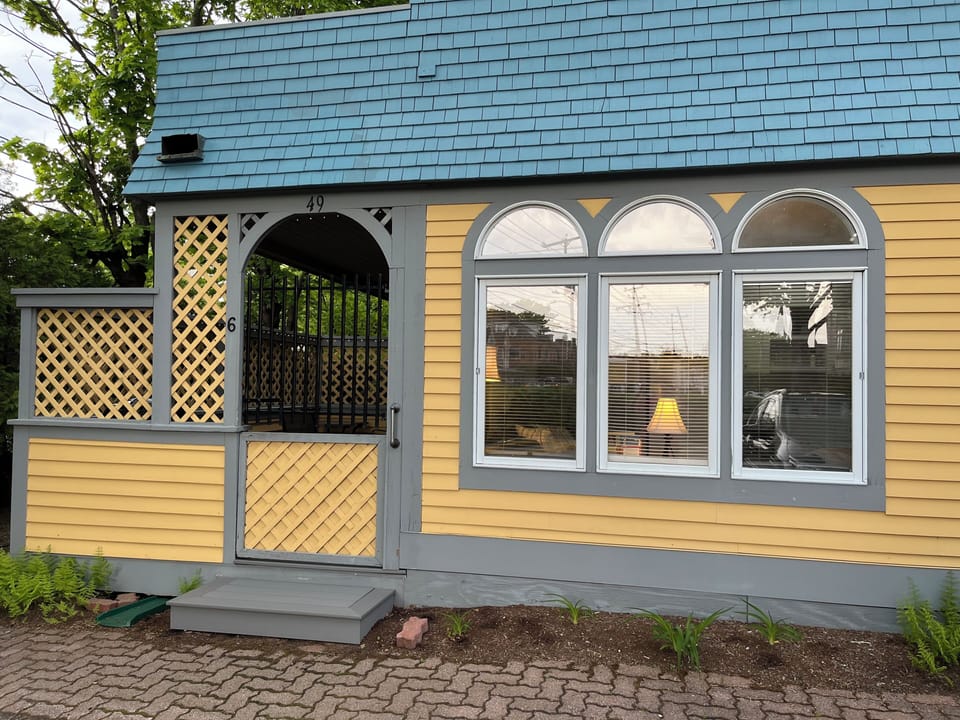Property entrance onto the private, partially covered deck.