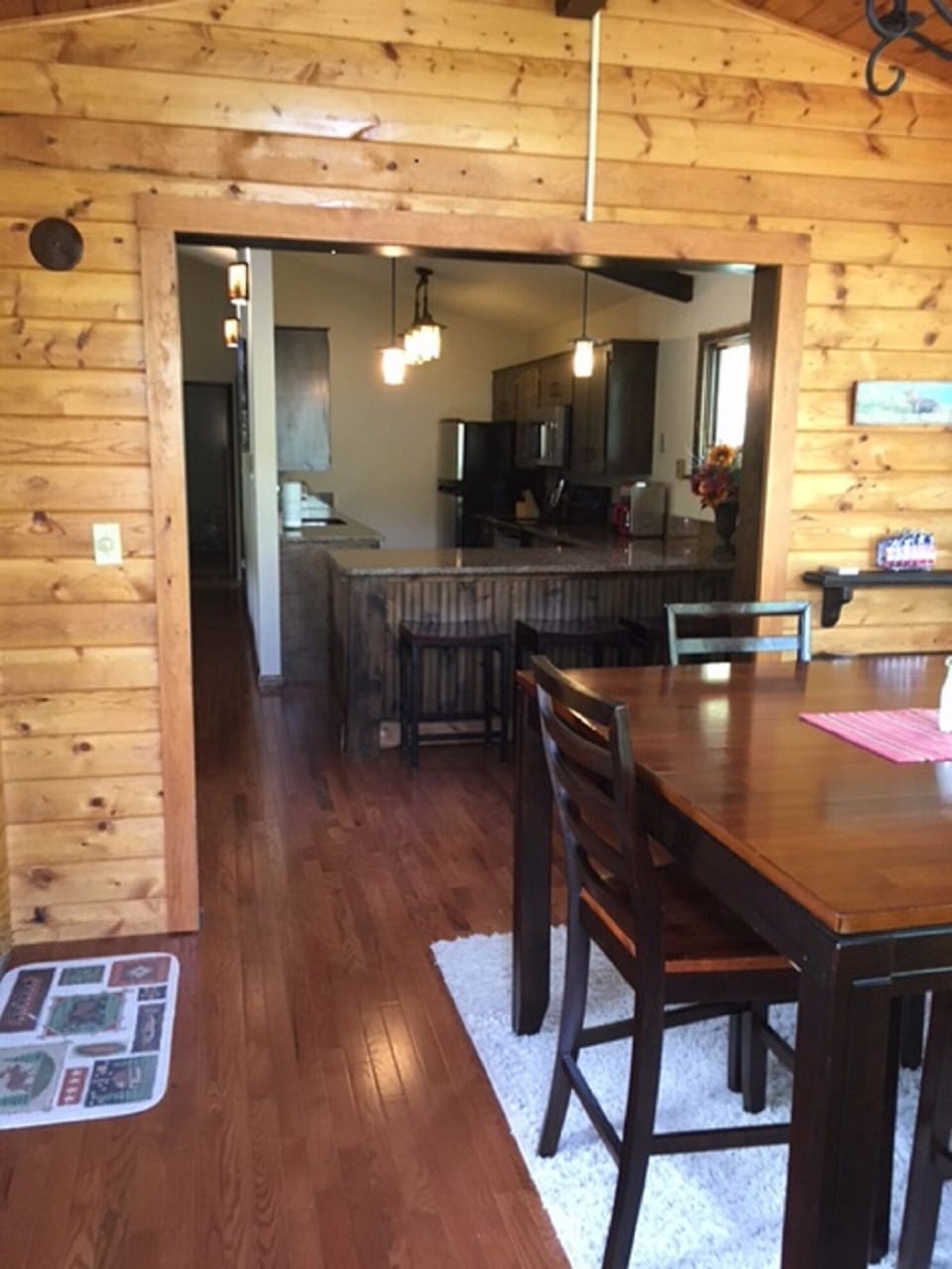 knotty pine eating area and kitchen