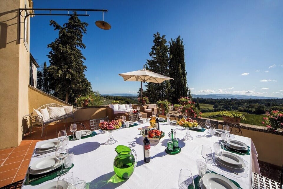 Terrace (directly connected to the main living Room), equipped with a large Dining table boasting amazing views..
