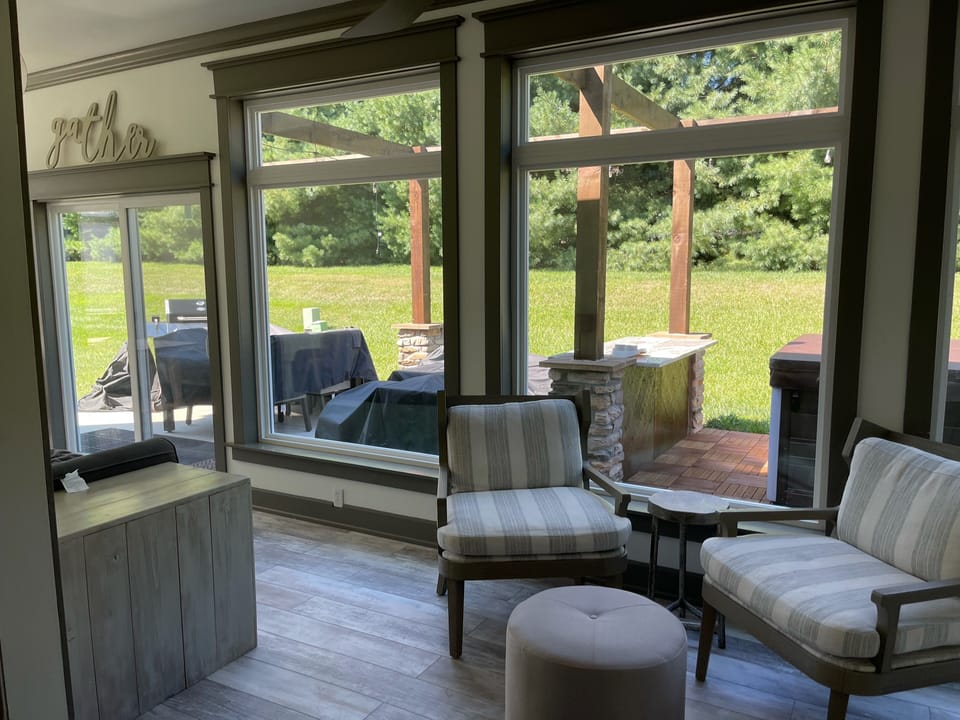 Sunroom with twin Xl daybed perfect for reading and napping 