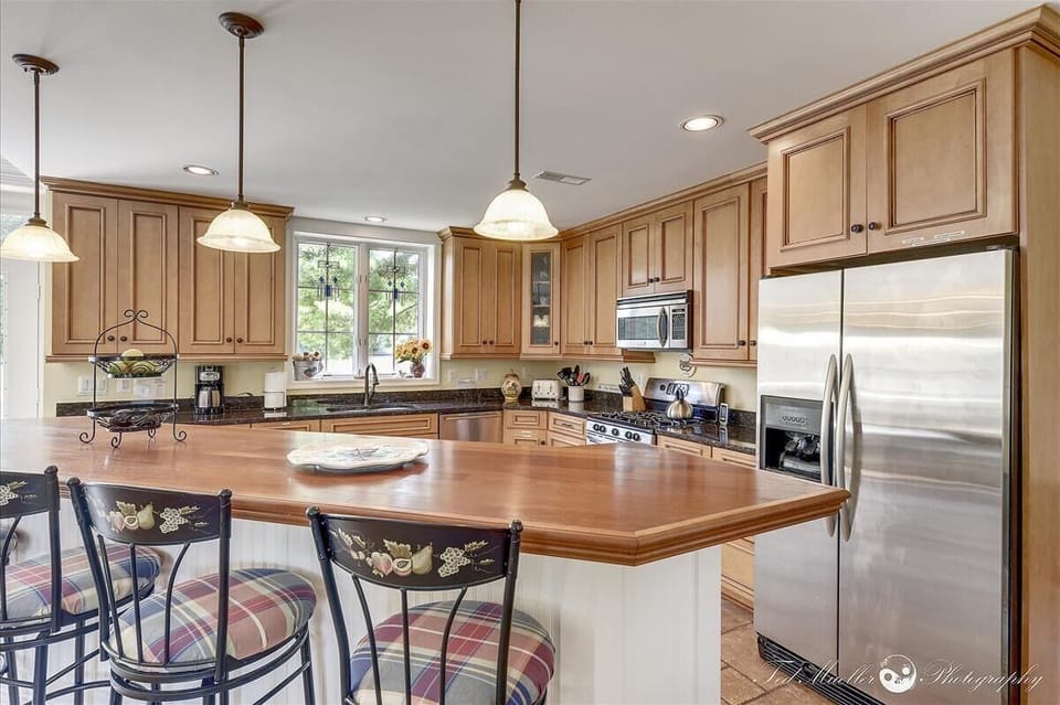 two refrigerators - kitchen and barn