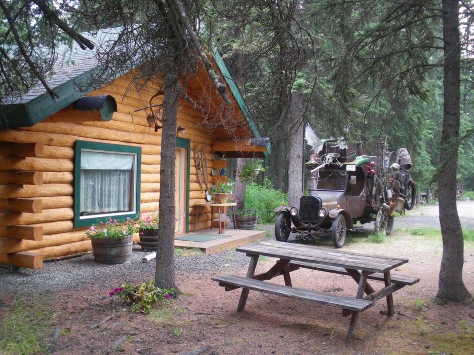 Model T parked outside. our cabin (display only) No parking in front of cabin.