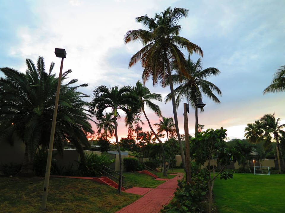 Walkway that surrounds each villa at Pineapple Village Villas. 