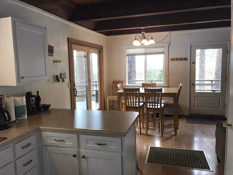 Kitchen/Dining room with beautiful views of the lake.