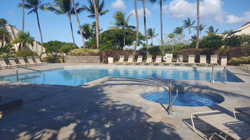 Lower Pool with hot tub, shower & restrooms.