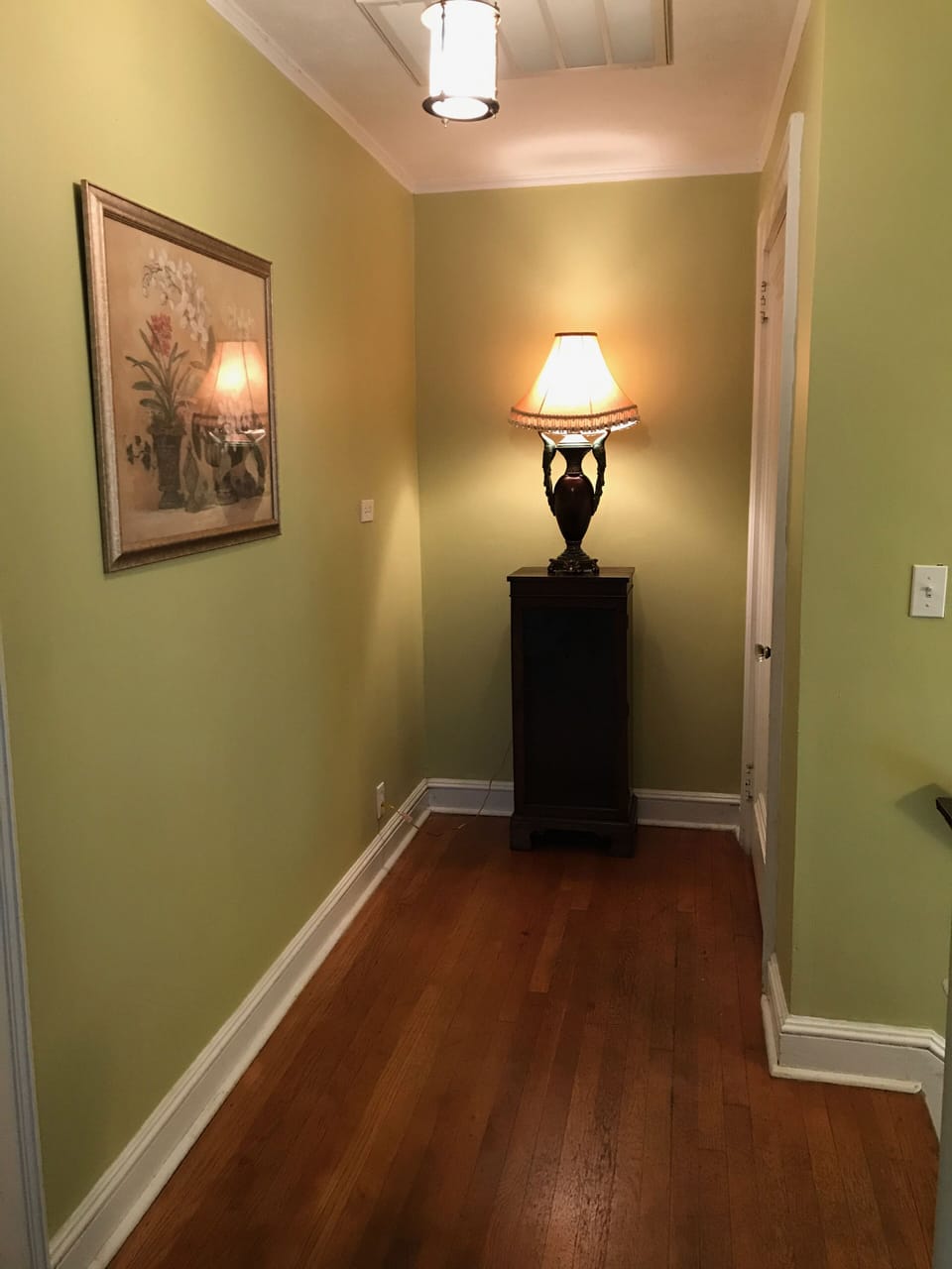 The Art Deco Peacock lamp gives the perfect warmth of welcome