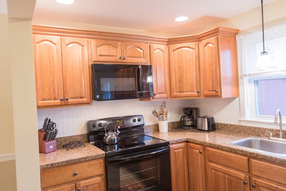 Beautiful hickory cabinets - coffee maker, toaster