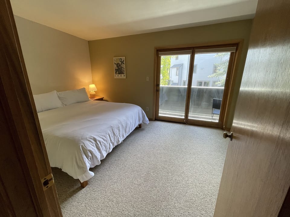 King size bed with attached balcony