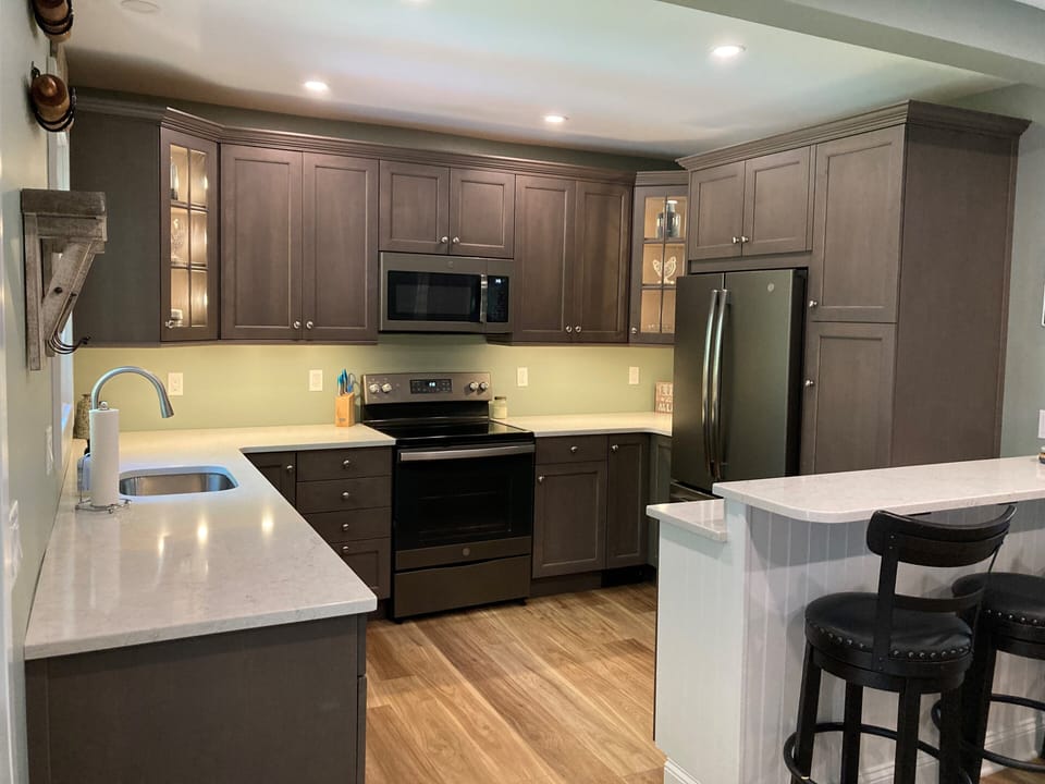 Spacious kitchen with bar