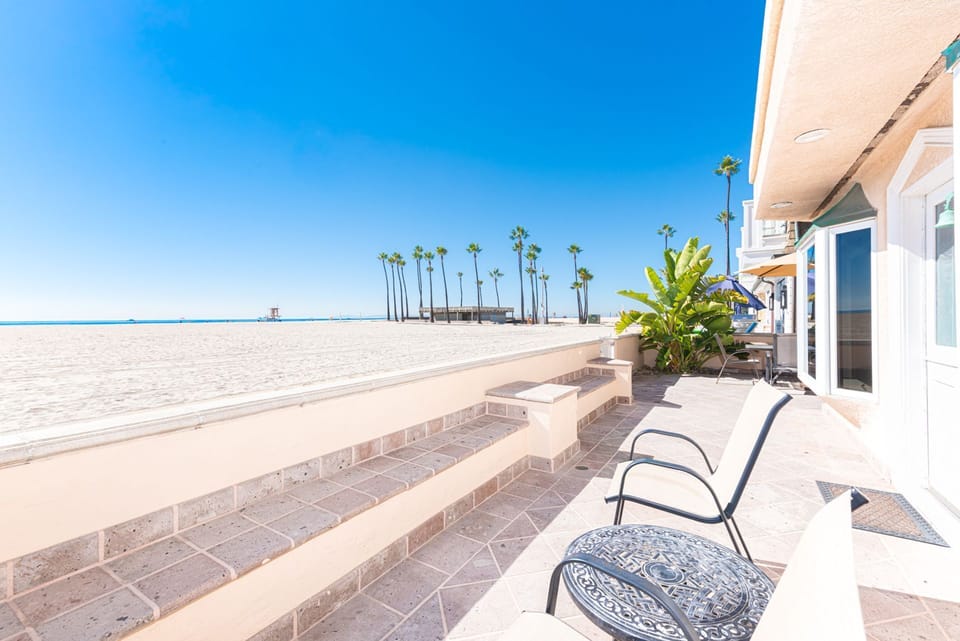 The best seat in the house is on the expansive front patio, which looks out onto the pedestrian boardwalk and beach. Keep your eyes peeled for dolphins!
                