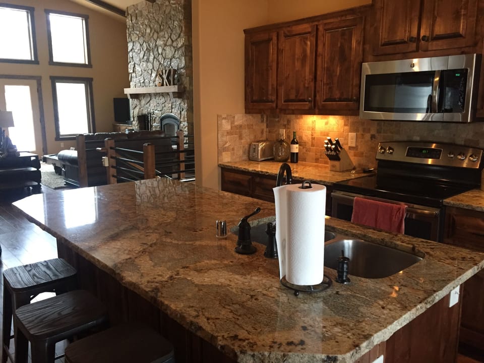 Kitchen is open with Living room