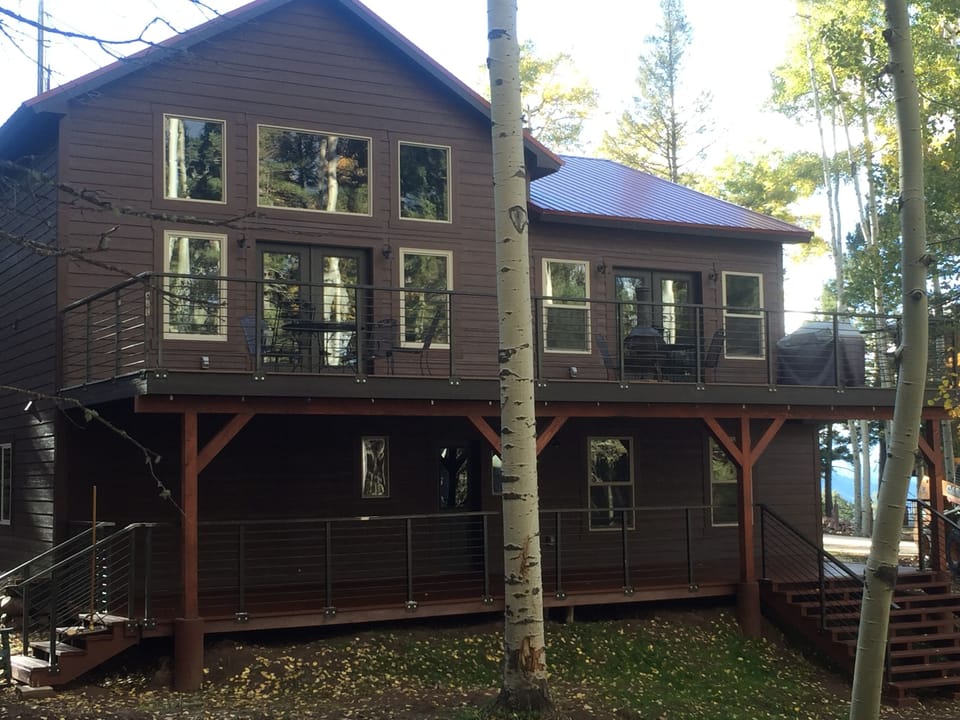 Back decks and stairs.  Ski right up to deck and leave skis on the rack provided