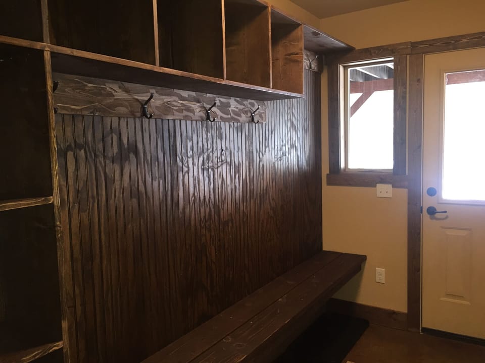 Ski/mud room that walks out to patio.  Storage for boots, coats, etc.  Not skis.
