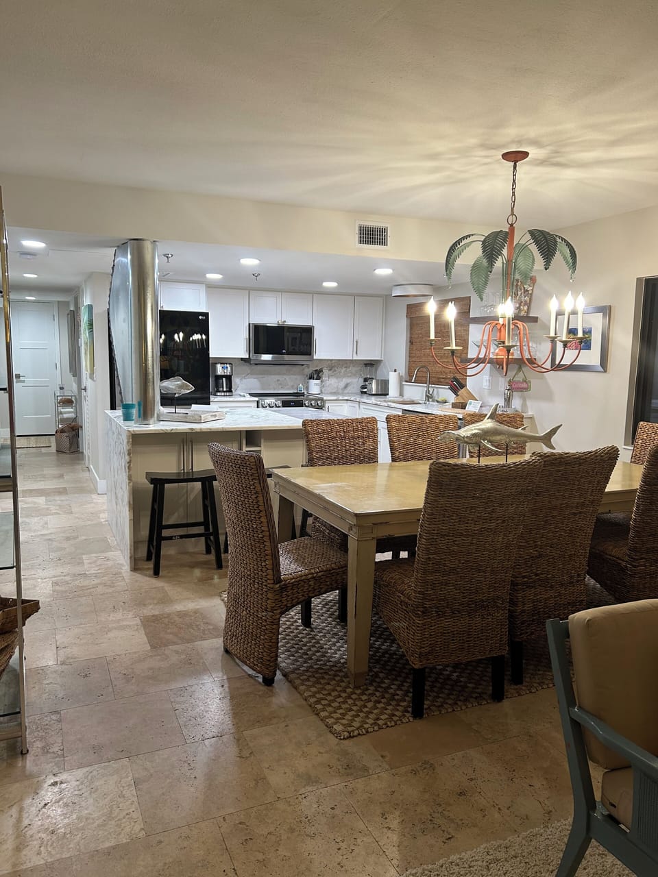 From LR looking toward front entrance with DR & Kitchen Island in the foreground