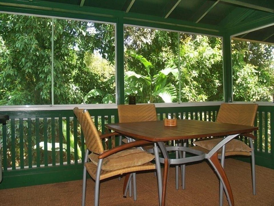 Screened in lounge lanai over the stream