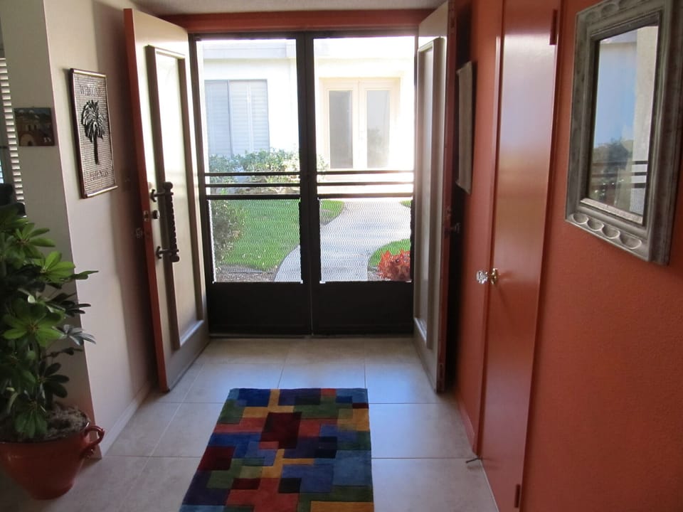 The entry hall looking out.