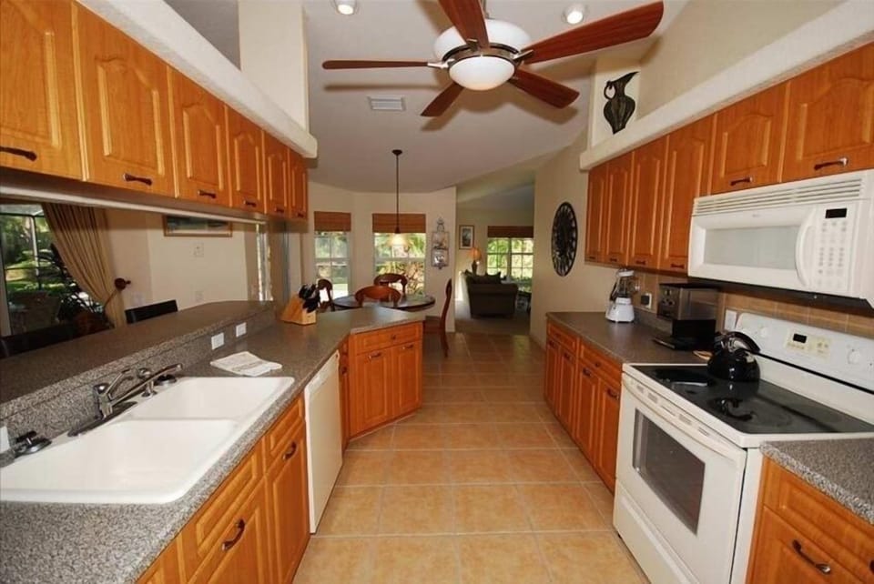 Open, fully equipped kitchen, with site lines throughout.