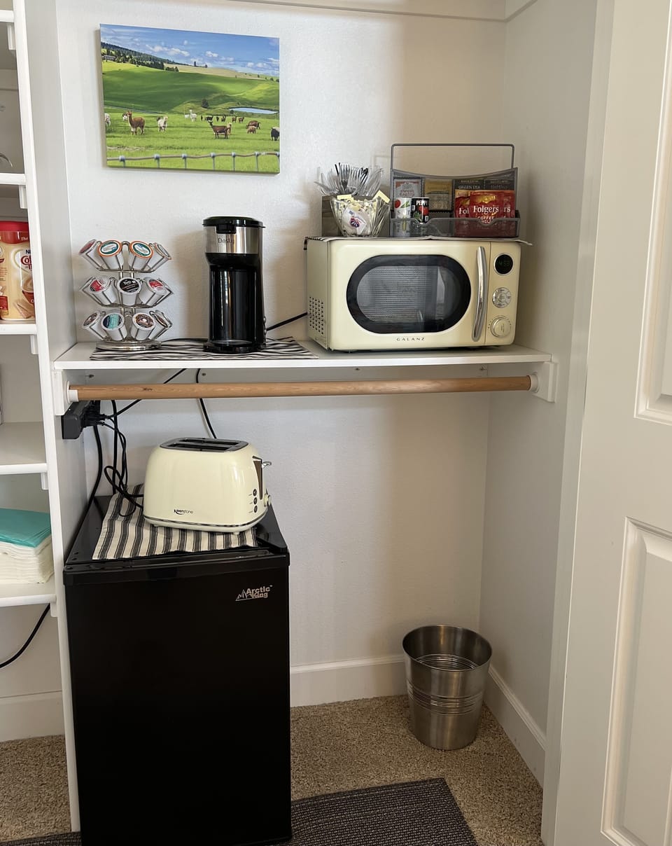Kitchenette includes: microwave, toaster, mini-fridge and coffee maker. 