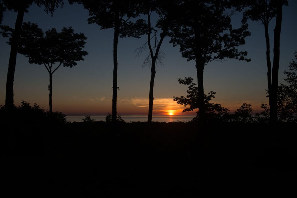 Here is a typical sunset from the porch to enjoy that wine and cheese with.