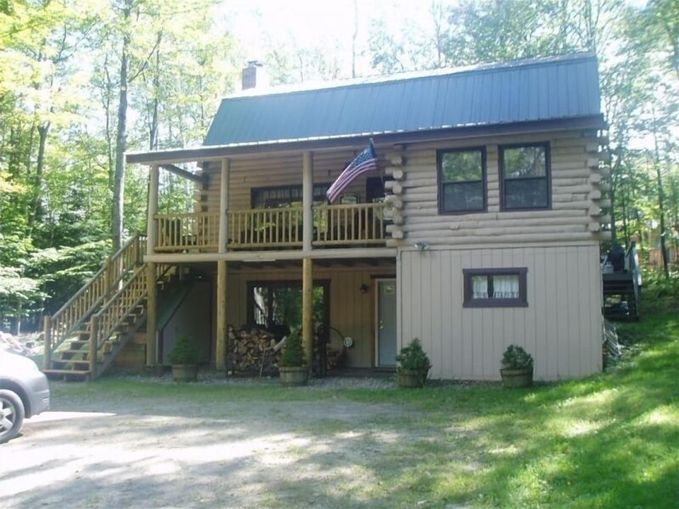 Great House picture from out front in Mid-Summer; Taken from fire pit location