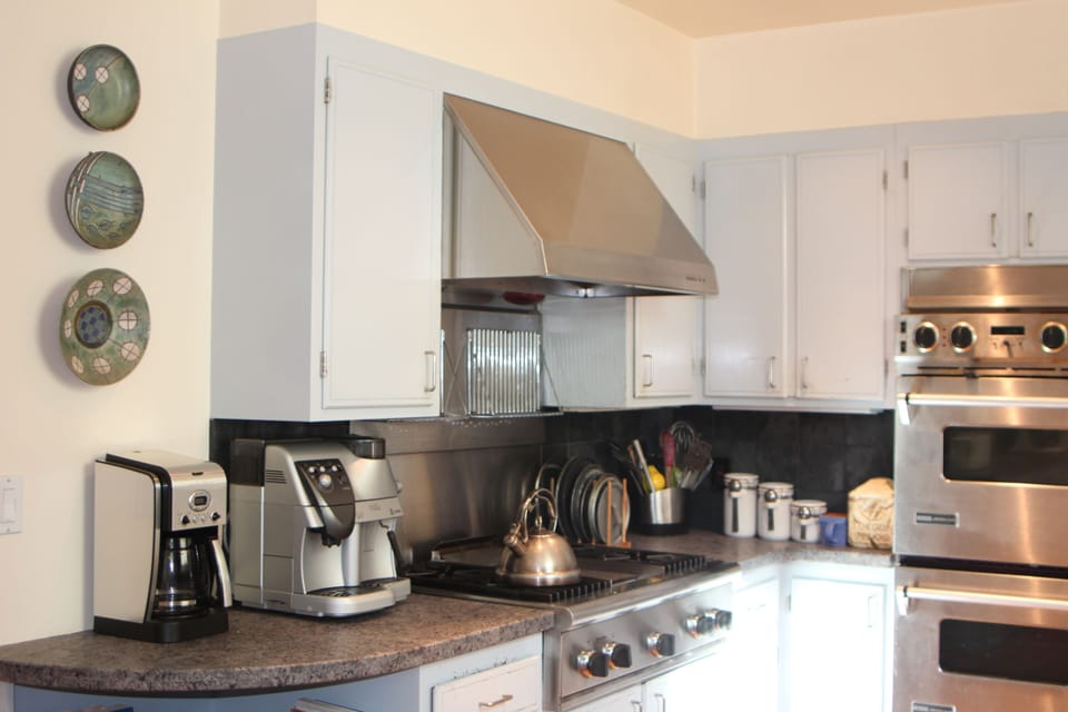 Cuisinart coffeemaker, range, hood with heat lamp plate warmers