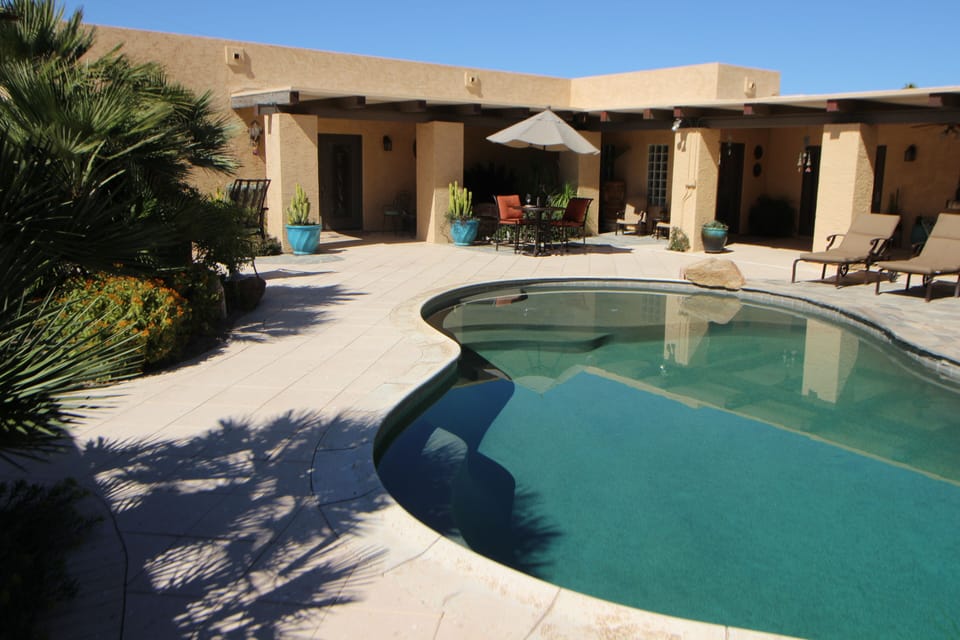 Poolside view of Pool Door to House
