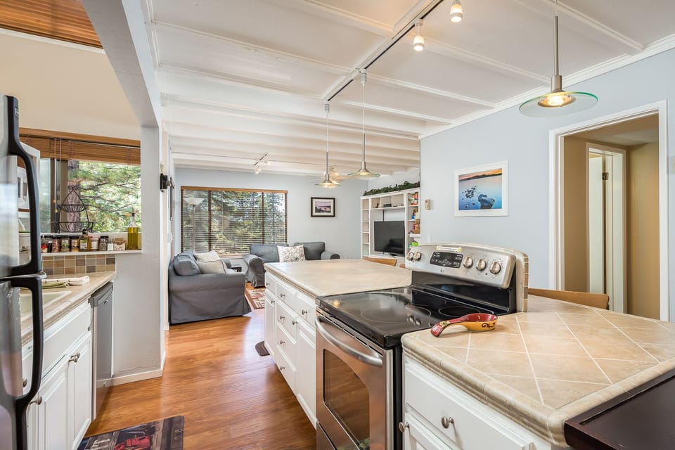 open kitchen area deck and living room