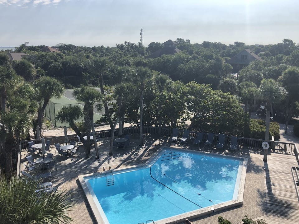 Safety Harbor Club pool and tennis courts, included in your stay