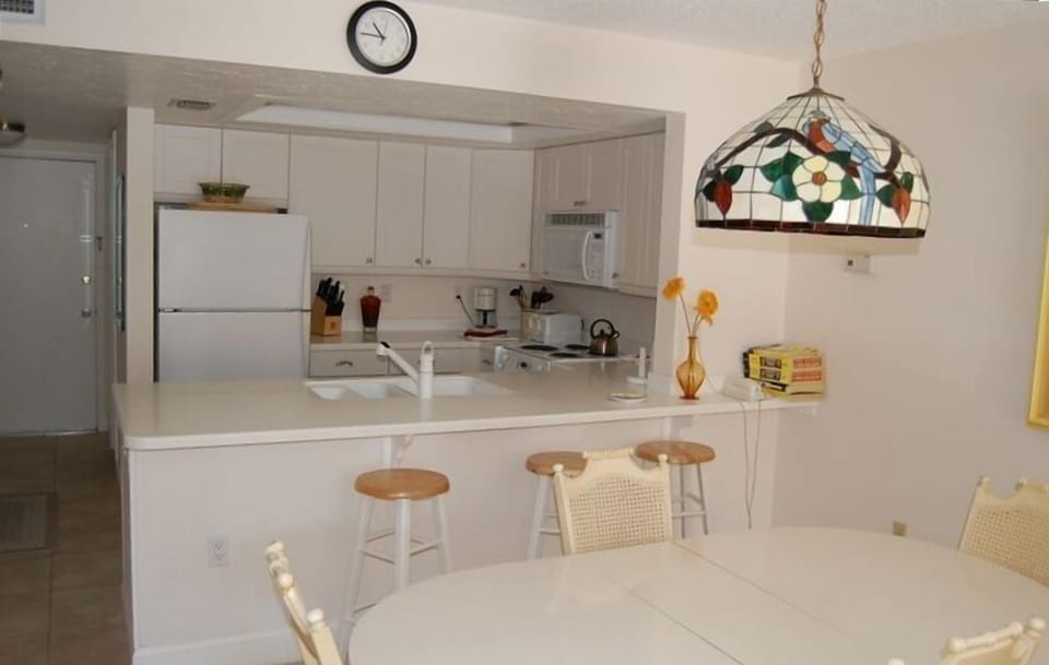 another view of the kitchen taken from the living/dining room