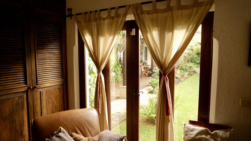 Master Bedroom French Doors opens into the main garden & pool area
