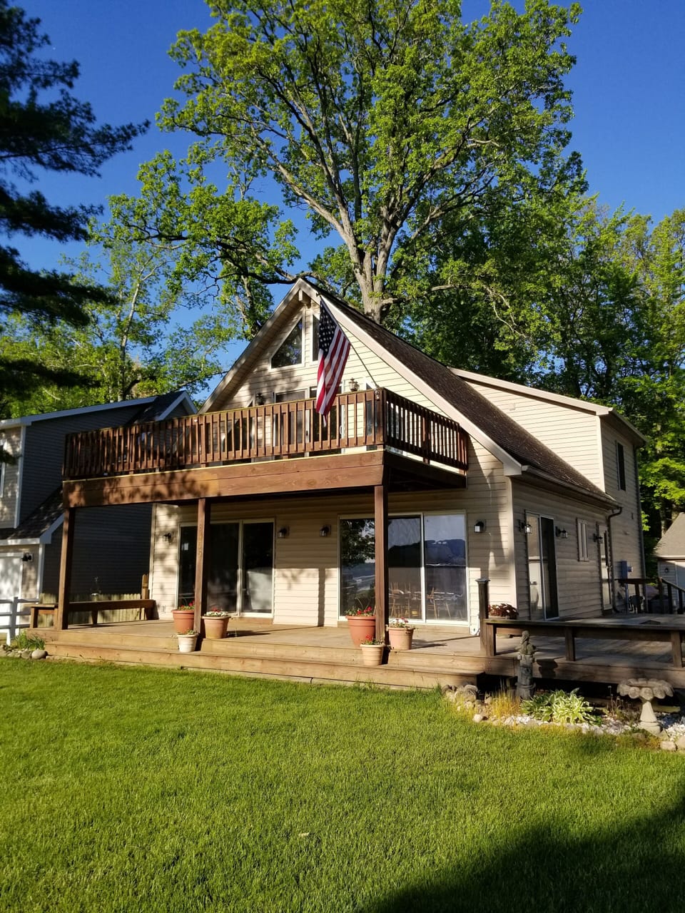 Front of house with large decks