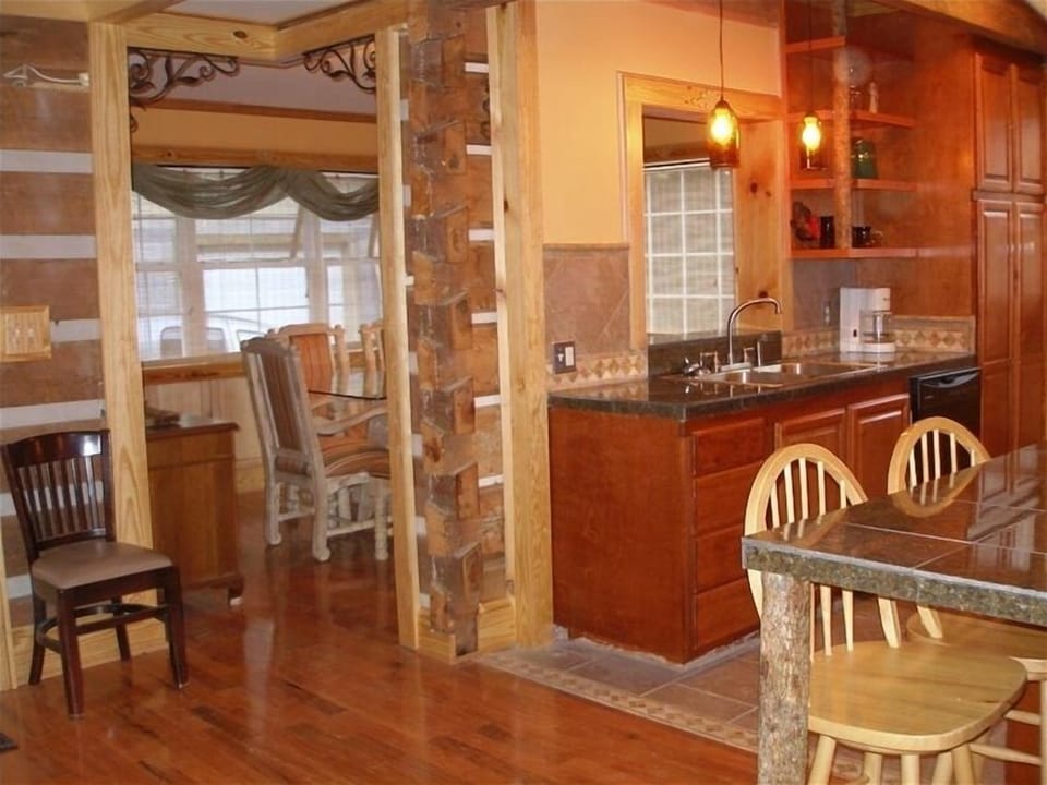 Custom gourmet kitchen, tile, ss appliances, granite, new DR addition.