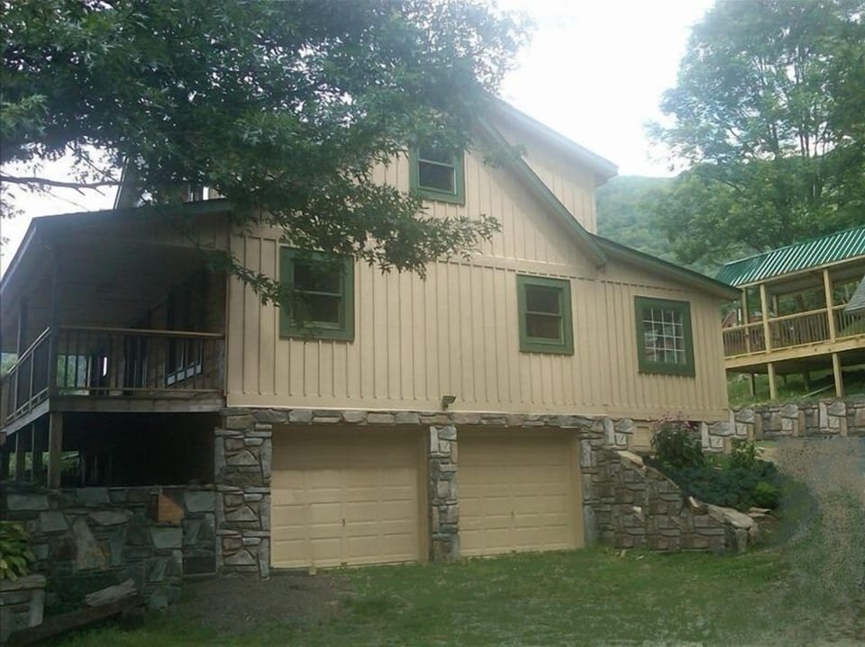 2 car garage and basement gear room, grade level rear entry.
