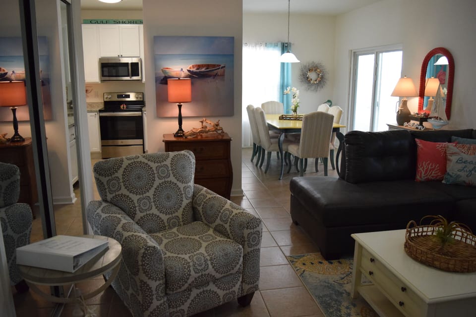 Living room, dining room and kitchen area.
