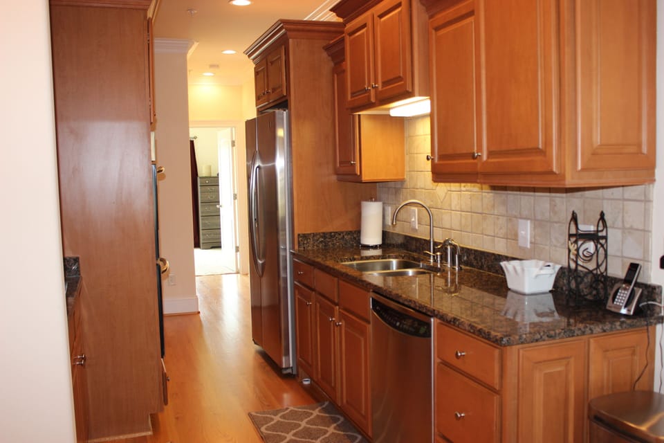 Fully equipped kitchen with granite counter tops.