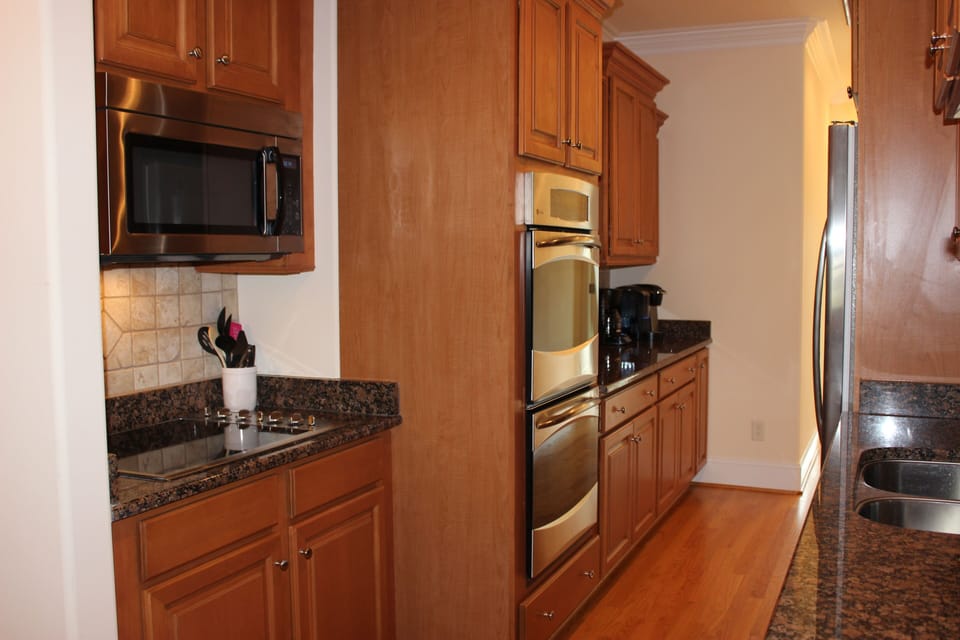 Glass top range, microwave, double ovens.