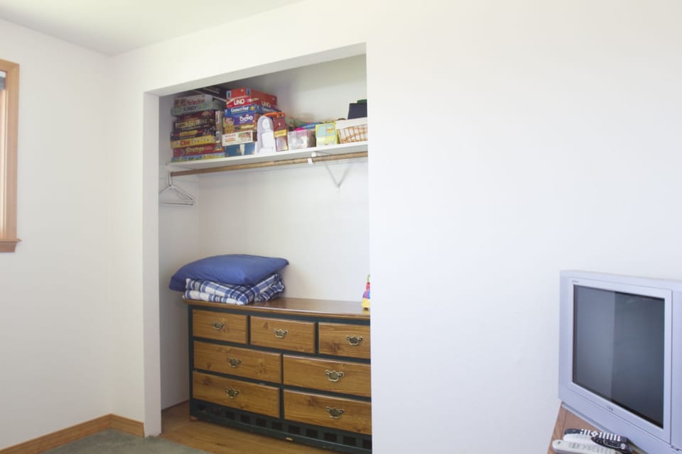 Dresser, TV,  extra bedding for trundle, and lots of games