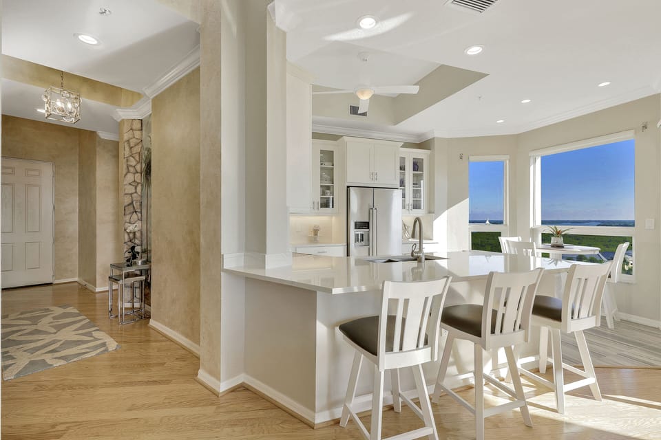 all quartz counters with counter stools for convenience