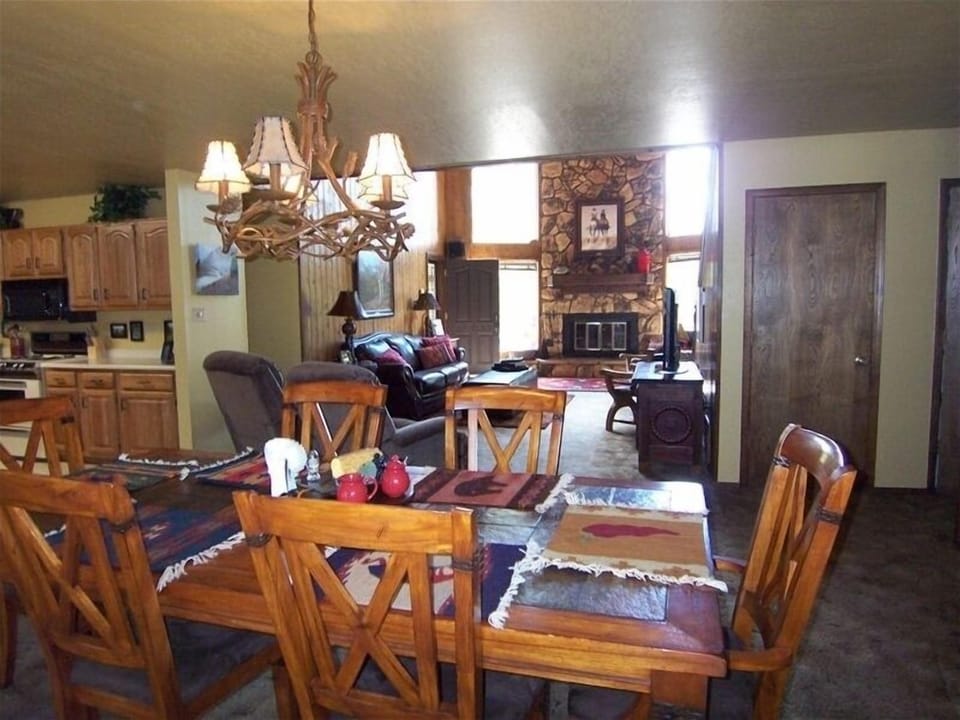 Dining Area with a view of the Kitchen and Living Area.