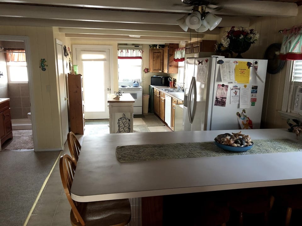 Kitchen with peninsula table.