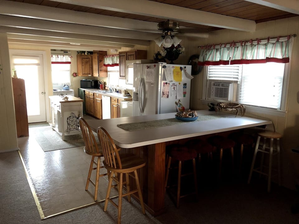 Kitchen with peninsula table.
