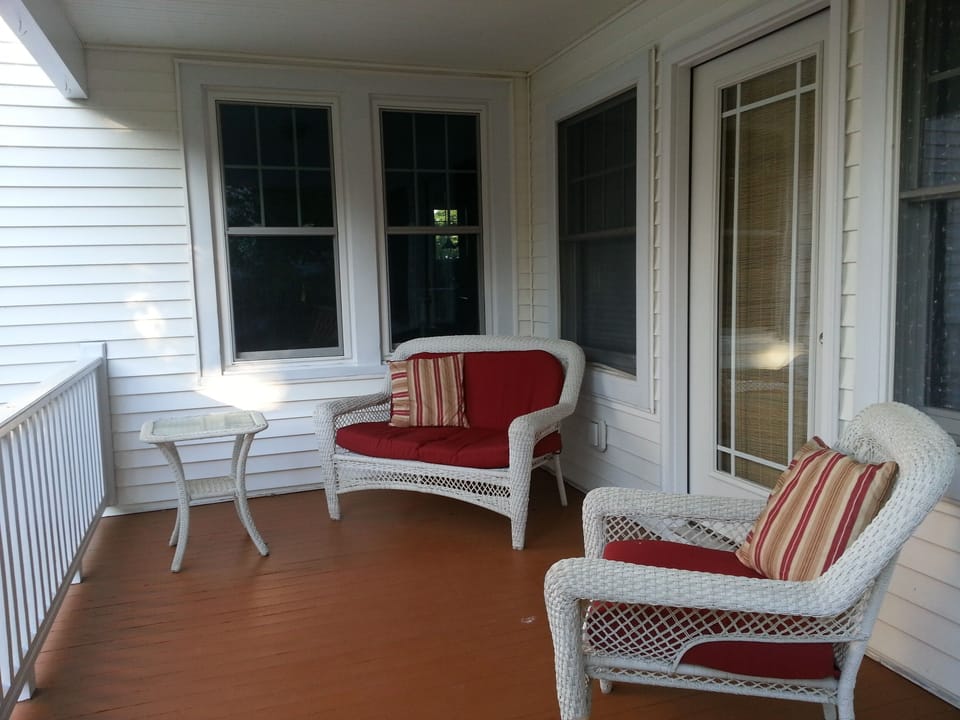 Enjoy the privacy of the side porch off the Master Bedroom Suite.