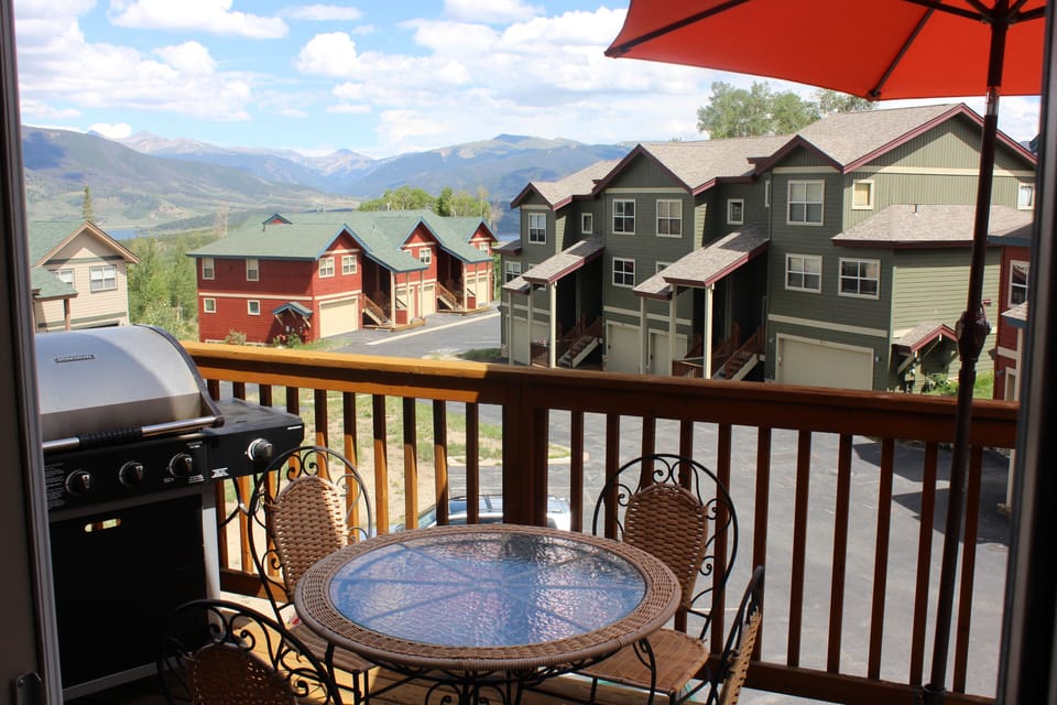 View of mountains from upper deck. Enjoy a drink and some food from the grill.