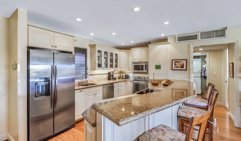 Fully stocked kitchen with new appliances. Cooking delight at your fingertips. 