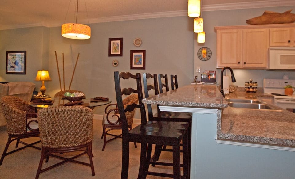 Fully Equipped Kitchen with additional seating at the Bar.  
