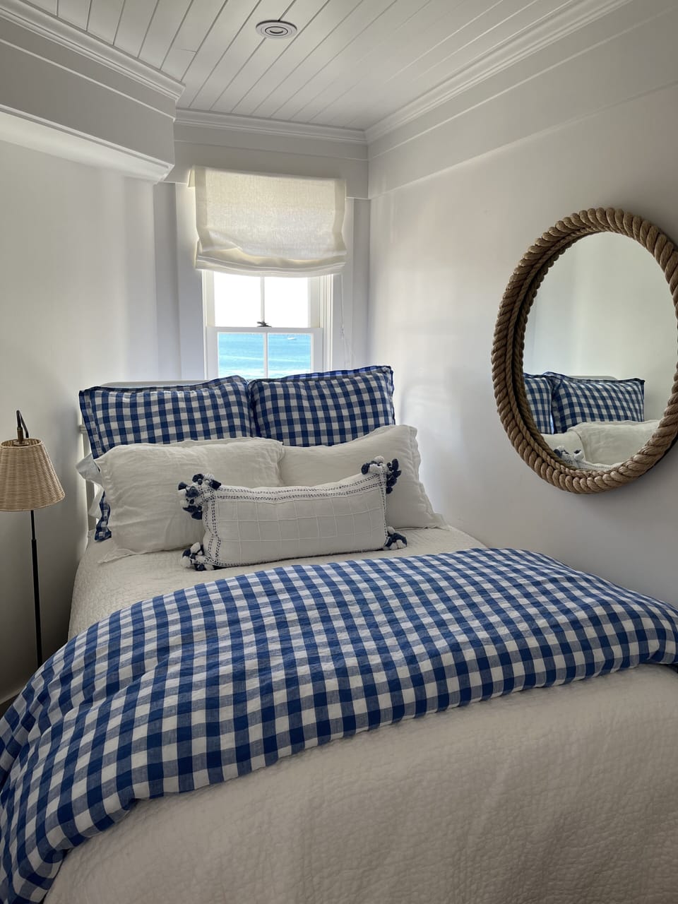 Sleeping nook with full-size bed and ocean view